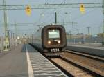 X31 - 32 X31 Contessa 4535 am 09.09.2002 auf der Fahrt von Kopenhagen nach Malm� in Malm� Syd. Die Neubaustrecke ist f�r 130 km/h zugelassen, der X31 f�r 180 km/h und die �resundbr�cke angeblich f�r 200 km/h, sie wird aber zur Zeit nur mit ca. 130 km/h befahren.