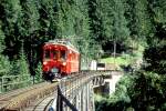 strecke-arosabahn-ch-a RhB EXTRA-GmP f�r GRAUB�NDEN TOURS 3658 von Arosa nach Chur am 31.08.1997 auf Frauentobel Viadukt mit Bernina-Triebwagen ABe 4/4I 32 - B 2247 - D� 4052I - Xk 9398 - Kkl 7052 - E 6623.
