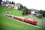 strecke-arosabahn-ch-a RhB SALON-Extrazug f�r GRAUB�NDEN TOURS 3658 von Arosa nach Chur am 30.08.1998 kurz unterhalb Arosa mit E-Lok Ge 4/4I 610 - As 1154 - WRS 3821 - As 1141.
