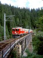 strecke-arosabahn-ch-a RhB SALON-Extrazug f�r GRAUB�NDEN TOURS 3658 von Arosa nach Chur am 30.08.1998 auf Frauentobel-Viadukt mit E-Lok Ge 4/4I 610 - As 1154 - WRS 3821 - As 1141.
