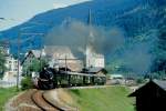 strecke-oberland-ch-di RhB Dampfzug 3747 f�r RH�TIA INCOMING von Ilanz nach Disentis am 13.08.1992 bei Trun mit Dampfok G 4/5 107 - B� 2060 - B 2246 - D� 4052I - B 2245.Hinweis: gescanntes Dia.
