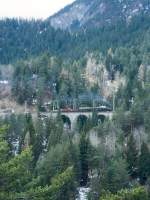 strecke-albulabahn-1-rei-fi RhB Dampf-GmP f�r Dampffreunde der Rh�tischen Bahn 3531 von Landquart nach Filisur am 23.04.1999 auf Schmittentobel-Viadukt zwischen Alvaneu und Filisur mit Dampflok G 2/4 1 - B� 2060 - D� 4052II - E 6604 - E 6605 - Kk 7046 - Hinweis: Teleaufnahme. gescanntes DIa
