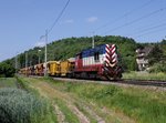 Die 740 658 mit einem Schotterzug am 04.06.2015 unterwegs bei Křešice.