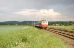 21.5.2011 16:05 ČD 242 255-8 mit einem Personenzug (Os) aus Klterec nad Ohř nach Cheb in der Nhe des Ortes Kynperk nad Ohř. 

