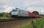 Metrans 386 018-6 mit Containerzug in Fahrtrichtung Nienburg(Weser). Aufgenommen in Eystrup am 23.07.2015.