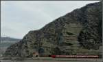 Tunnel Ein DB Regio kurz vor der Einfahrt in den Ro�stein Tunnel aufgenommen am 19.03.10 in Oberwesel an der gegen�berliegenden Rheinseite. (Jeanny)