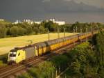 TX Logistik AG ES 64-012 von TXL mit einem Autozug in der N�he von Burgweinting am 13.07.2010 