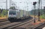 TX Logistik AG 185 697-0 mit einem Umleiter-KLV am 25.07.2010 durch Buchholz(Nordheide)