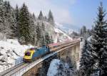 470 005 mit OIC 592 nach Villach am 23.02.2013 am Hundsdorfer-Viadukt zwischen Bad Hofgastein und Angertal.