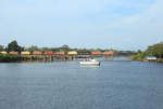 432 crosses the Eau Gallie River near Melbourne whilst working FEC920-06, the Fort Pierce - Pineda local, 6 Feb 2020