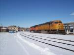 BNSF 8834 & 9148 sit at the siding near the Burlington, Iowa depot.