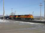A pair of BNSF diesel locomotives perform switching duties in the yard at Burlington, Iowa.