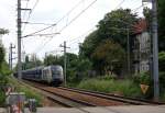 ES 64 U2-035 der WLB mit einem Autotransportzug kurz vor ...