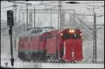 Winterdienst MEG 314 wartet mit dem Meiningen-Pflug aus Angerm�nde am 11.01.2010 bei dichtem Schneetreiben auf Einfahrt in den Hbf Stralsund.