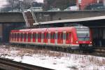 422 042-2 mit der S9 nach Essen in Wuppertal Steinbeck,6.2.2010. ...