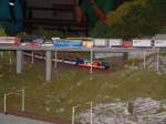 Zuge SOB-Komposition mit Re 4/4 456 092-6 im Miniaturwunderland Hamburg / Schweizer-Abschnitt. Das Original f�hrt als Voralpen-Express in der Schweiz von Romanshorn nach Luzern und retour.