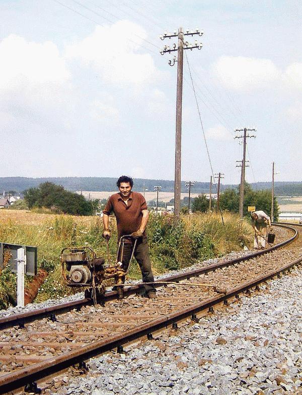 Tightening the screws of the hook through track after the