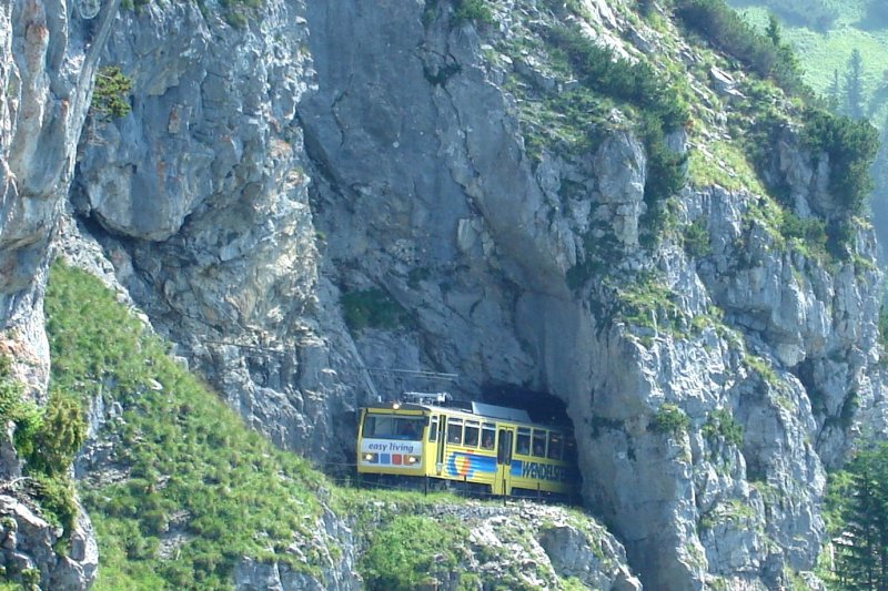 Railcars Wendelsteinbahn just before the entrance to the mountain station