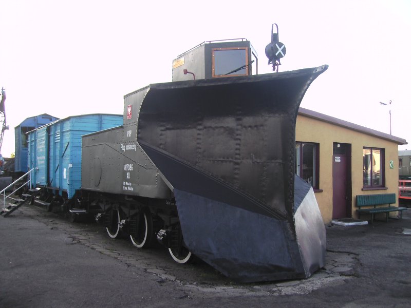 An old snow plow cars of the PKP in BW