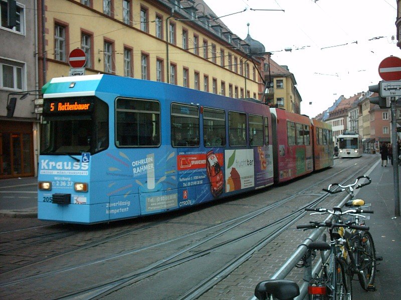 205 of the tram car Würzburg (WSB) are driving along