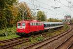 TRI 110 198-9 mit TRI-Wagenberfhrung in Wuppertal, Oktober 2025.