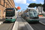 Italia, Roma, ATAC  Tramways 9126 and 9220 on line 8, Piazza Venezia  3/3/2014