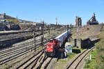 6505 ist mit einem Kalkzug zwischen Flémalle-Haute und Kinkempois unterwegs und hat soeben die Überreste des Stahlwerks passiert.

Lüttich 07.04.2026