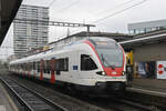 RABe 523 012, auf der S3, wartet am 20.10.2025 beim Bahnhof Pratteln.