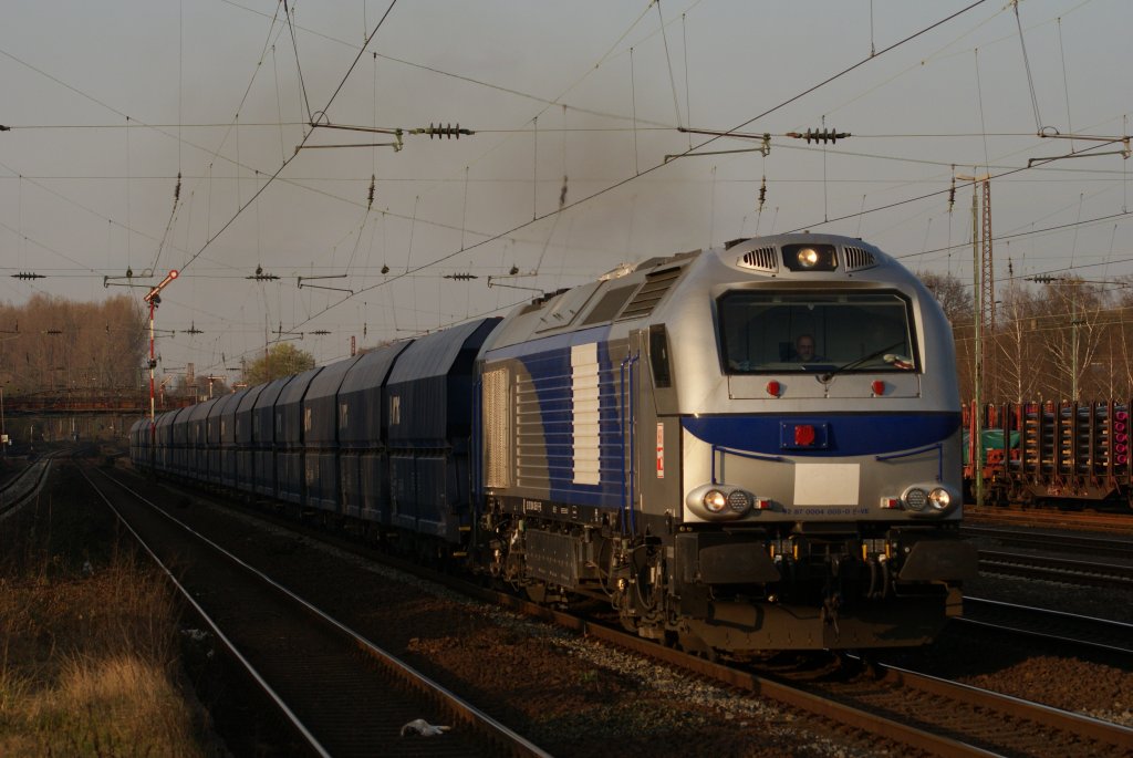 0004 005-0 der HGK mit dem DGS 93374 Sythen - Kln bei der Durchfahrt durch Dsseldorf-Rath am 28.03.2011 Gru an den Tf !