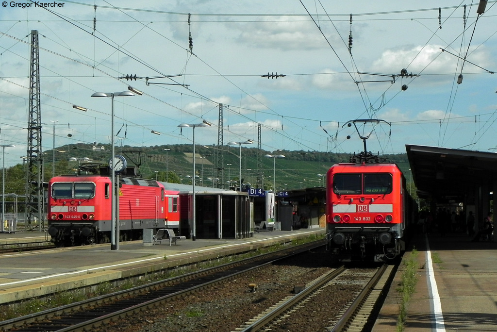 06.09.2011: Rechts die 143 802-7 mit dem RE 4934 (Stuttgart-Wrzburg), links die 143 645-0 mit der RB 39925 (Heilbronn-Stuttgart). Aufgenommen am 06.09.2011 in Heilbronn Hbf,
