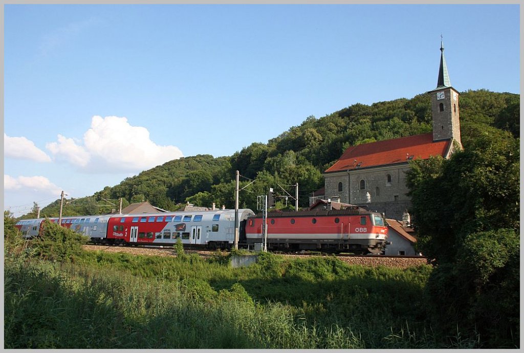 1044 289 fhrt mit REX 7134 durch Hflein an der Donau. 27.07.11