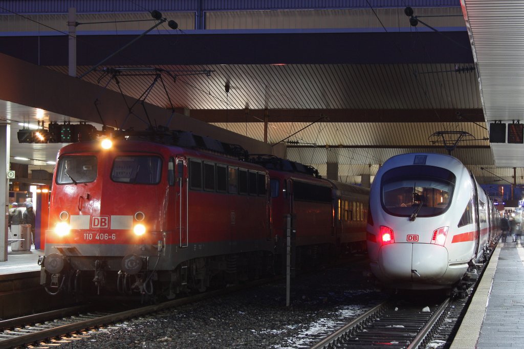 110 406 am 27.1.13 mit 110 437 und IC 130 kurz vor der Abfahrt in Dsseldorf Hbf.Rechts steht ein ICE nach Berlin Ostbahnhof.