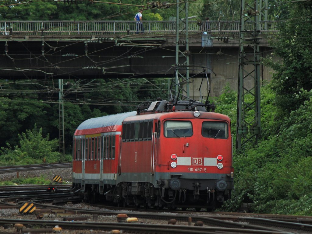 110 497-5 schiebt am 07.08.2012 einen RE4 Verstrker aus Aachen West Richtung Hbf.