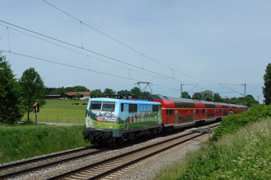 111 039 DAV mit einem RE nach Salzburg am 29.05.11 unterwegs am B� Vogl.