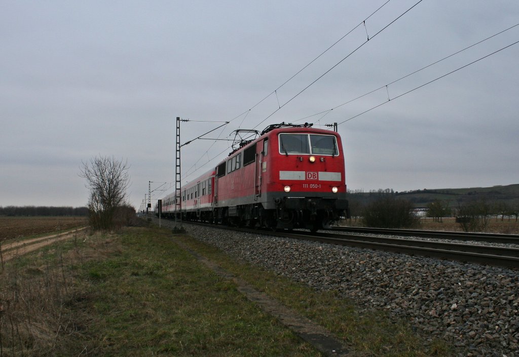 111 050-1 mit einer RB nach Neuenburg (Baden) am 02.03.13 bei Hgelheim.