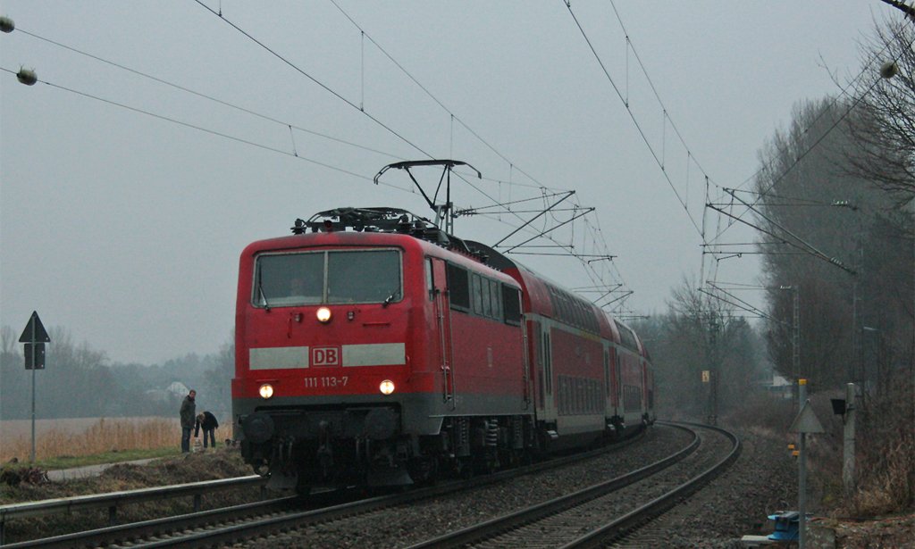 111 113 mit dem RE10422 aus Dortmund nach Aachen am B kurz hinter bach-Palenberg 8.2.10