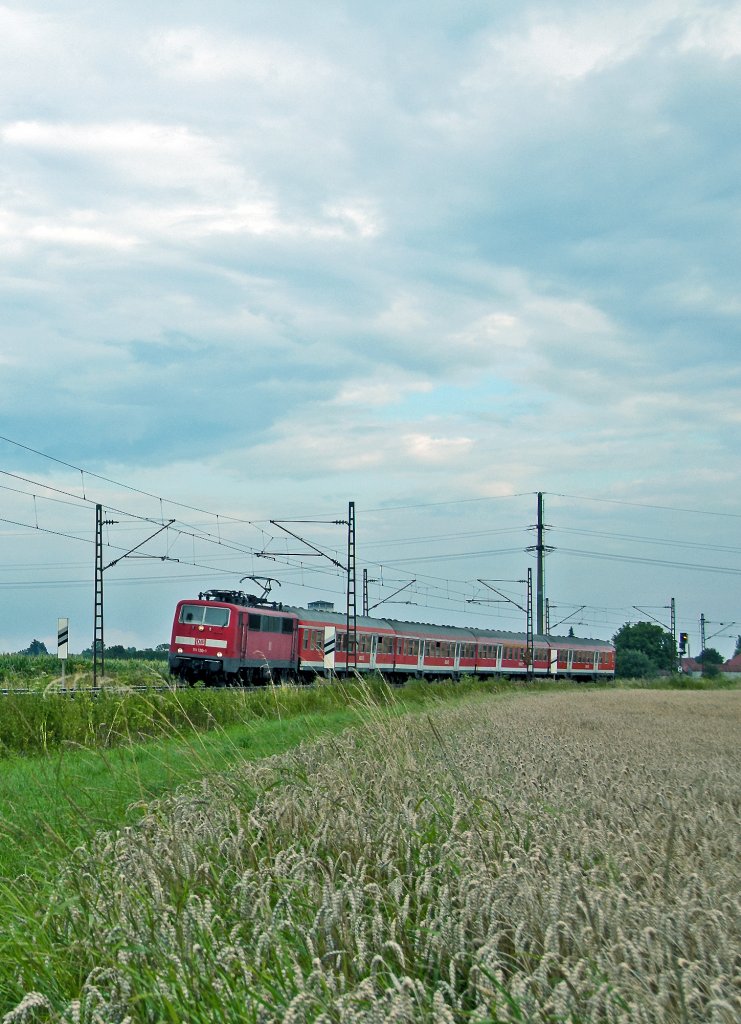 111 130 mit RB von Plattling nach Neumarkt i.d.Obpf. am 27.07.2010 kurz nach Plattling.