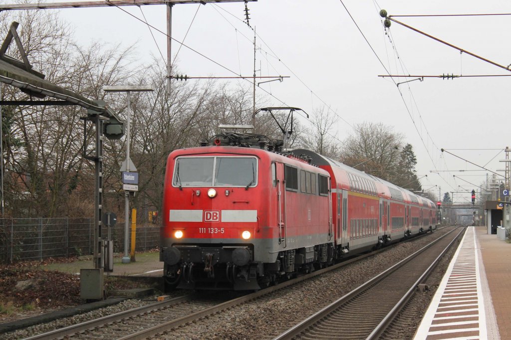 111 133-5 mit RE 4851 Rheine-Braunschweig auf Bahnhof Ibbenbren am 28-12-2012.