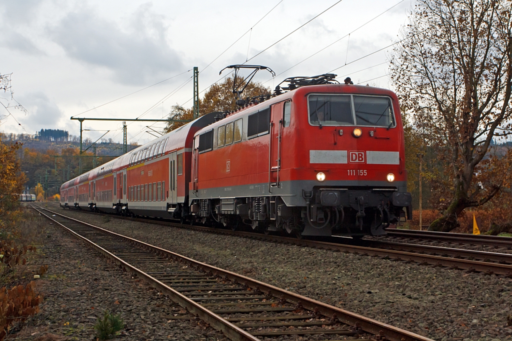 111 155 mit dem RE 9 - rsx - Rhein-Sieg-Express (Aachen-Kln-Siegen) fhrt am 11.11.2012 Richtung Siegen, hier bei Betzdorf-Bruche.