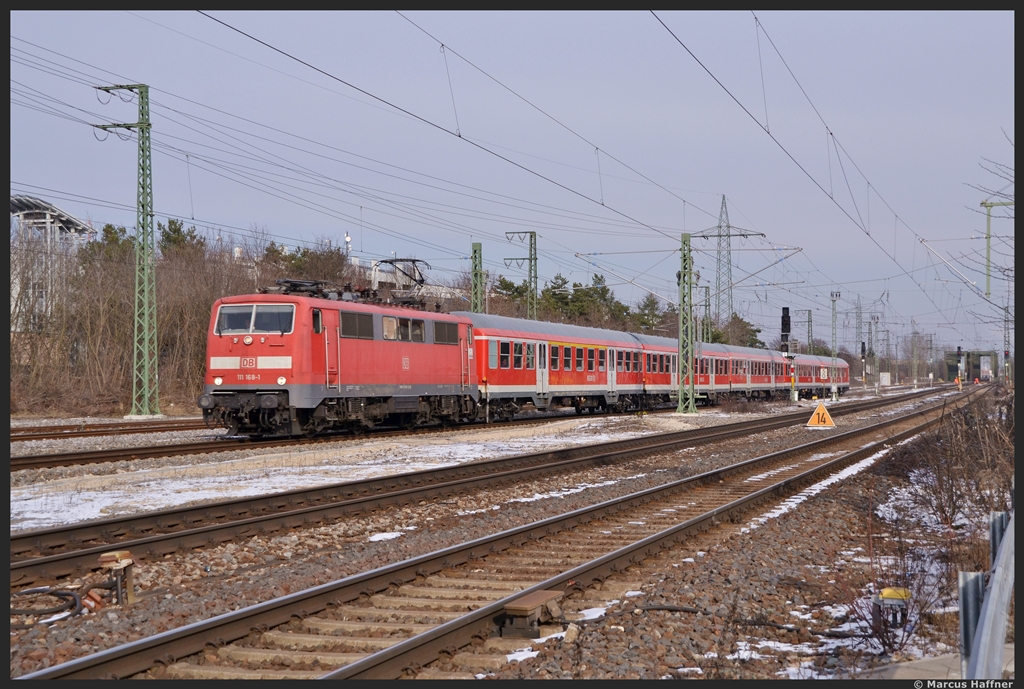 111 168-1 wird mit ihren  Flachpark  gleich den Bahnhof Nrnberg-Stein durchfahren.
Aufnahmedatum war der 11. Februar 2013
