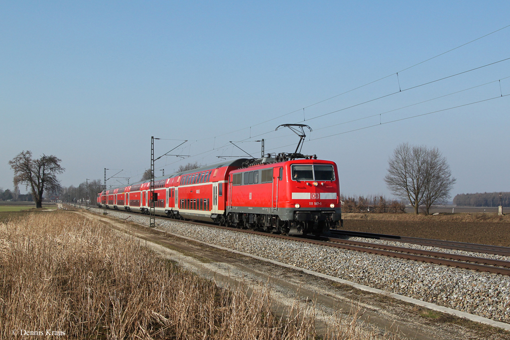 111 187 mit RE 4072 am 03.03.2013 bei Langenisarhofen.