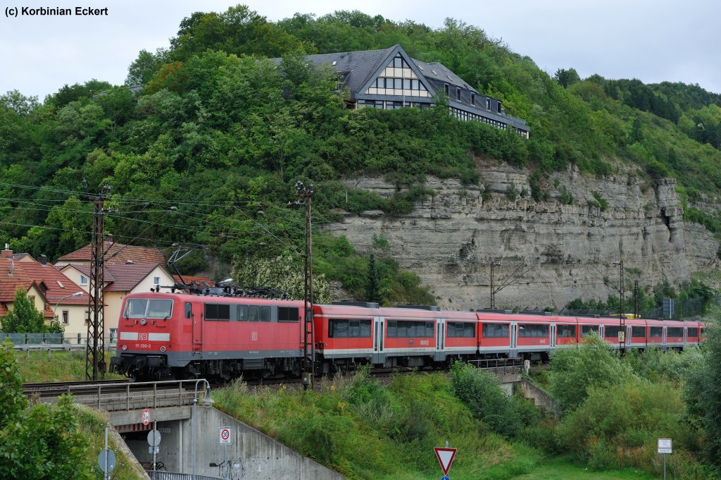 111 200-2 mit dem RE 4613 aus Aschaffenburg Hbf nach Wrzburg Hbf bei Retzbach-Zellingen, 10.08.2012