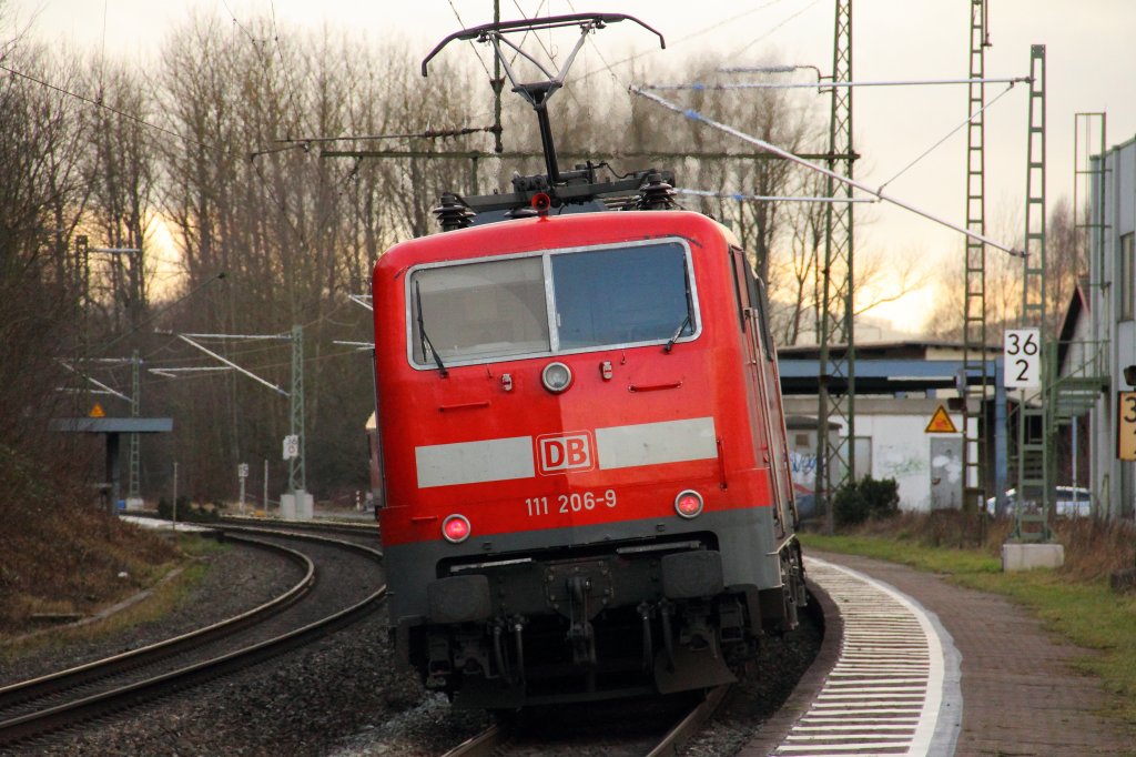 111 206-9 bei einem kurzen Halt im Bahnhof Michelau am 06.09.2011.