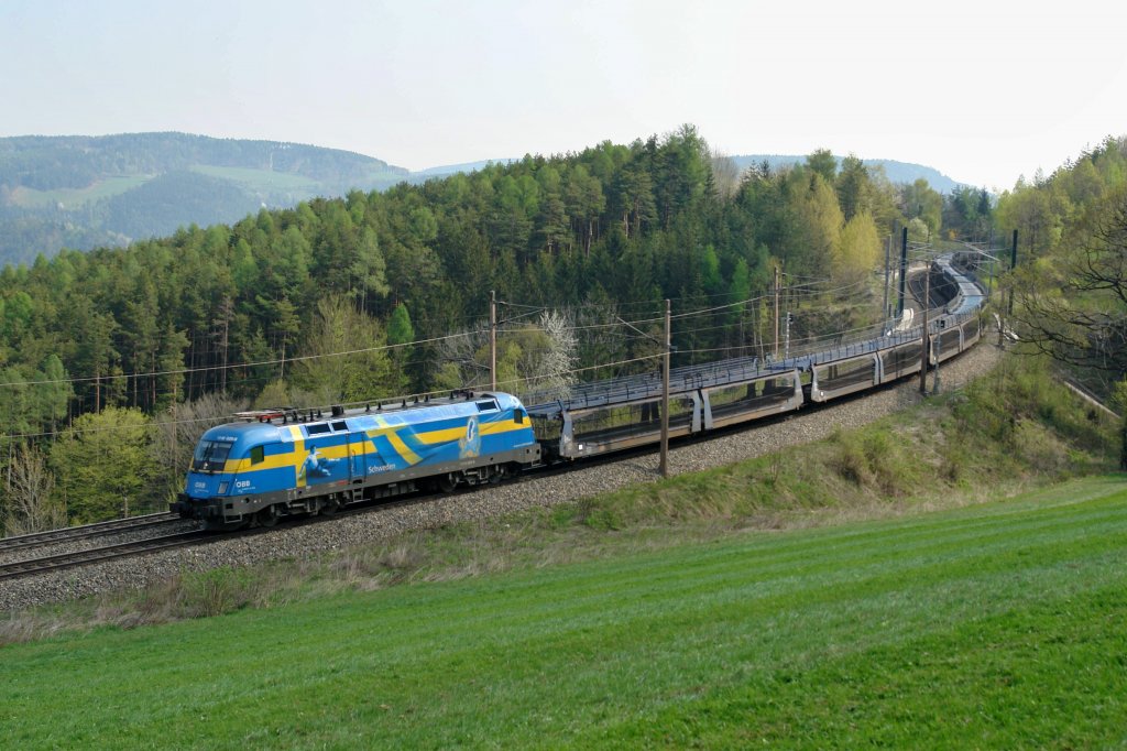 1116 029  EM-Schweden  mit einem leeren Autozug am 16.04.2009 unterwegs bei Eichberg.