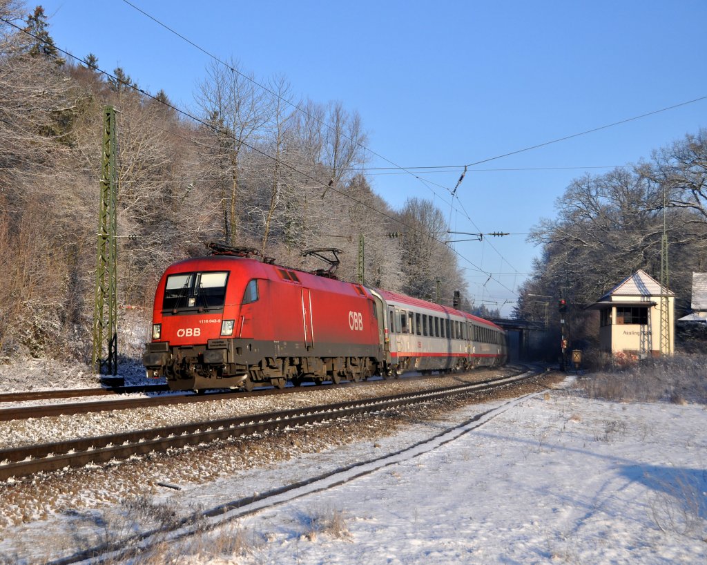 1116 043 mit EC 111 nach Klagenfurt bei der durchfahrt in Aling.Aufgenommen am 25.1.2012