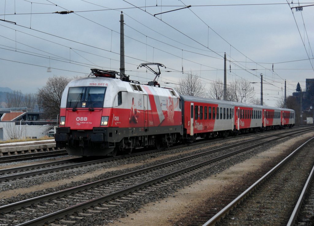 1116 087  EM-Polen  mit einem REX nach Innsbruck am 24.12.2008 bei der Durchfahrt in Brixlegg.