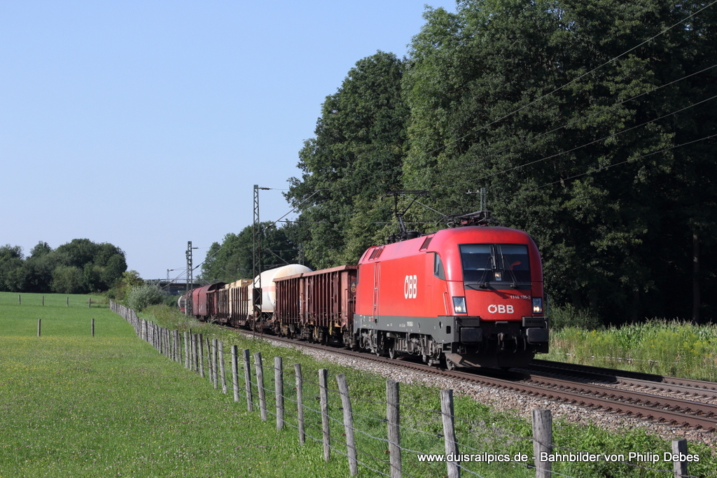 1116 135-3 (BB) fhrt am 27. Juli 2012 um 17:30 Uhr mit einem Gterzug durch Grokarolinenfeld