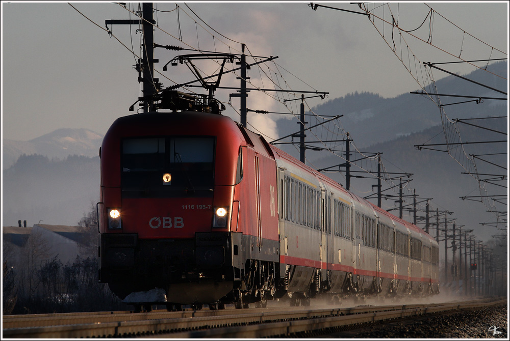 1116 195 zieht IC 731  Kelag Energie Express  von Wien Meidling nach Villach. Zeltweg 16.1.2012