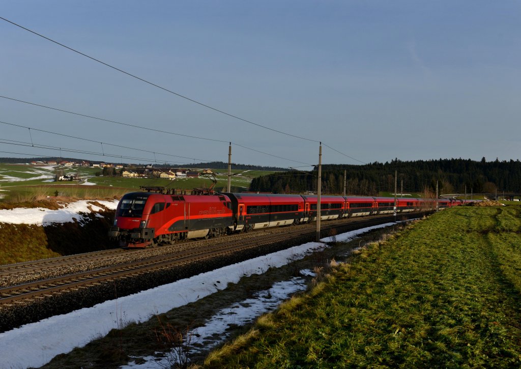 1116 207 mit einem Railjet nach Zrich am 24.12.2012 bei Pndorf.