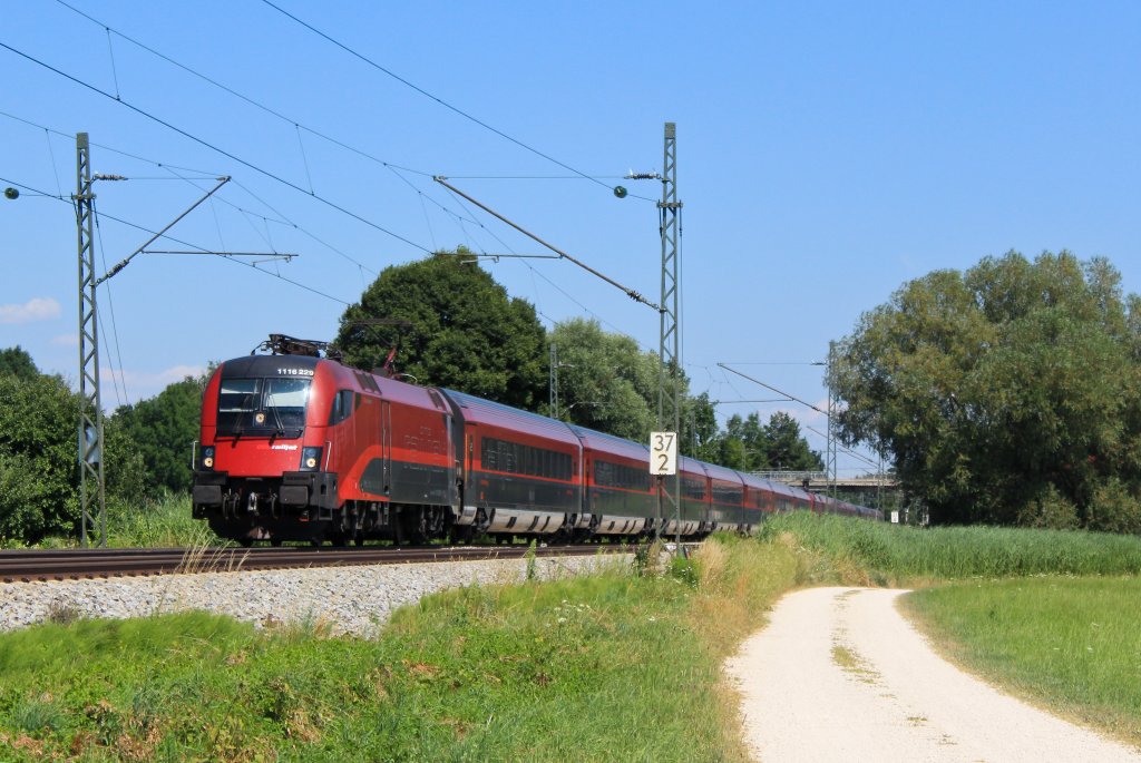 1116 229 + 225 mit einem RJ auf dem Weg nach Rosenheim, aufgenommen am 23. Juli 2013 bei bersee.